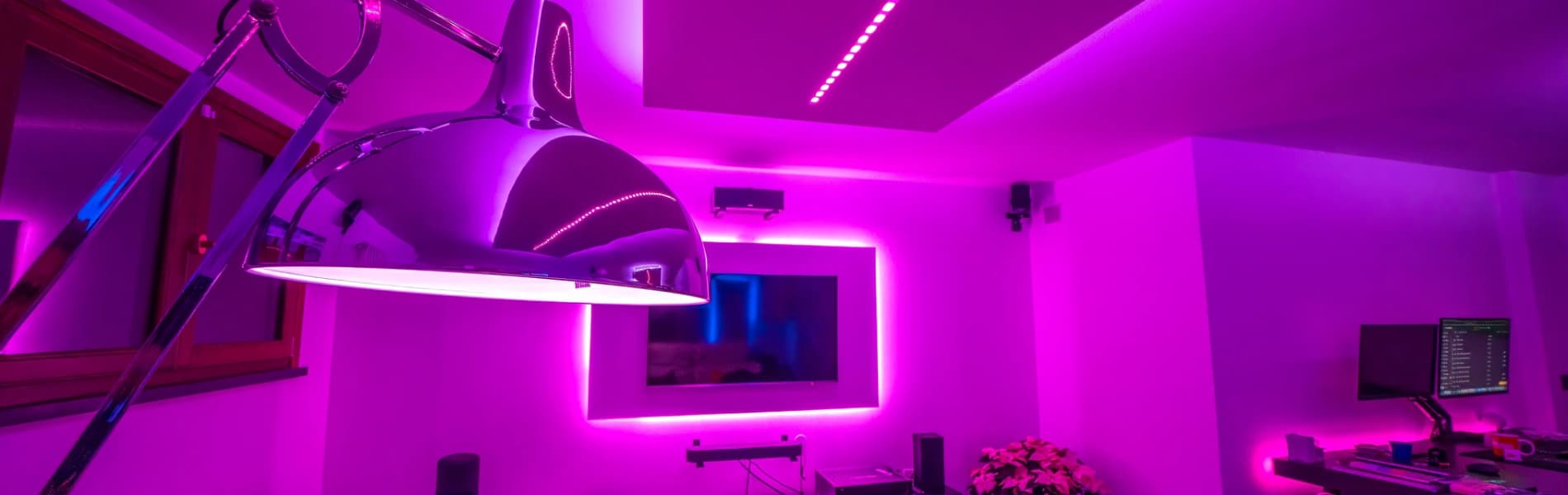 Clean, modern home theater wall with concealed cables and tidy equipment