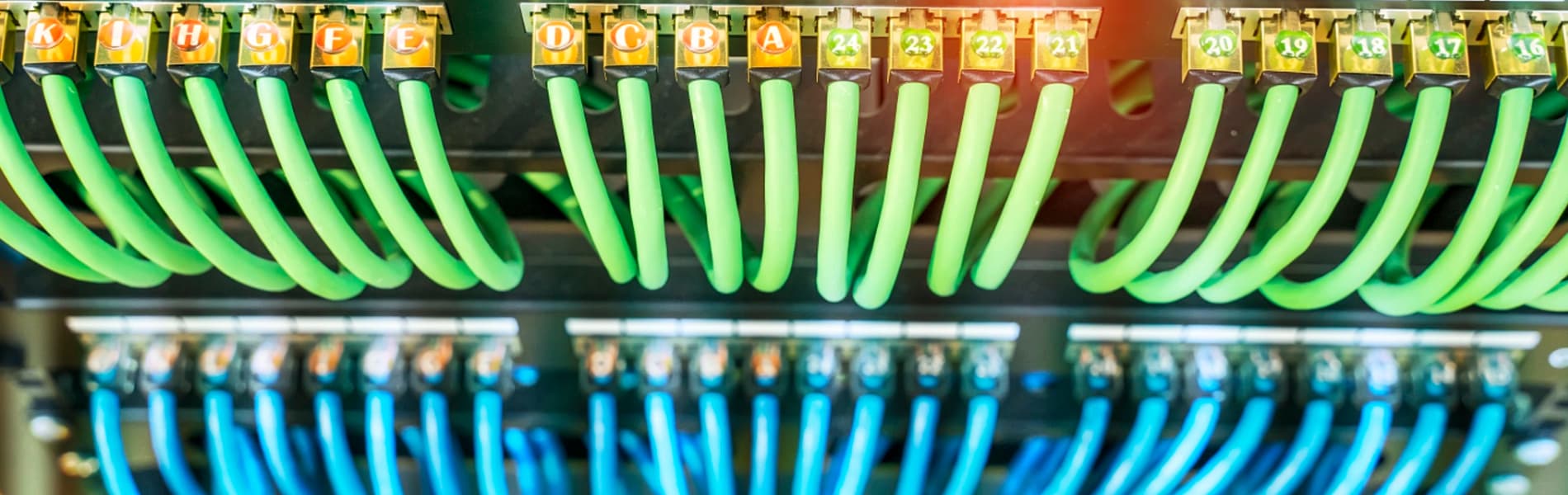 Exterior home lighting brightening a driveway camera scene for security